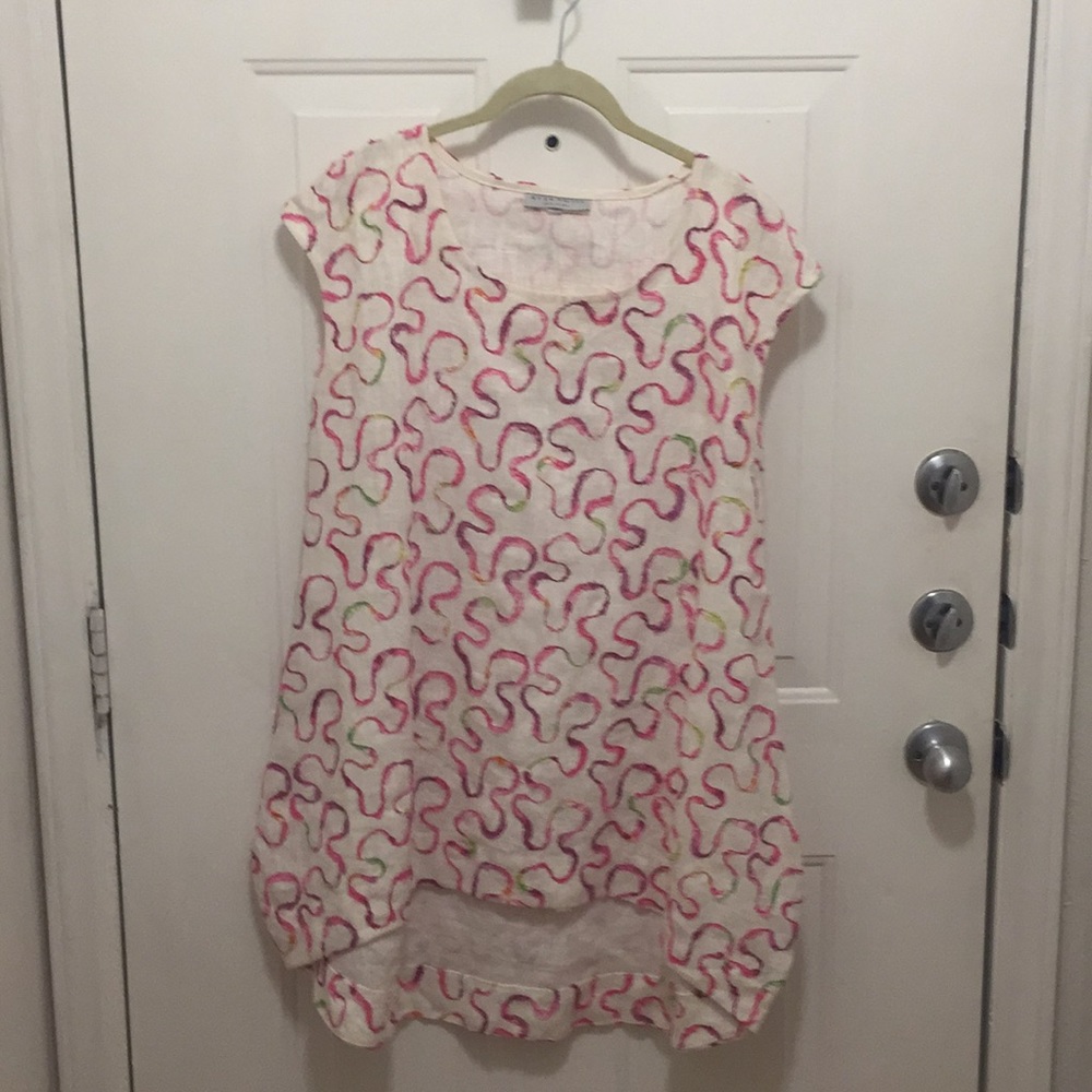 A stunning Bryan Walker high and low dress .